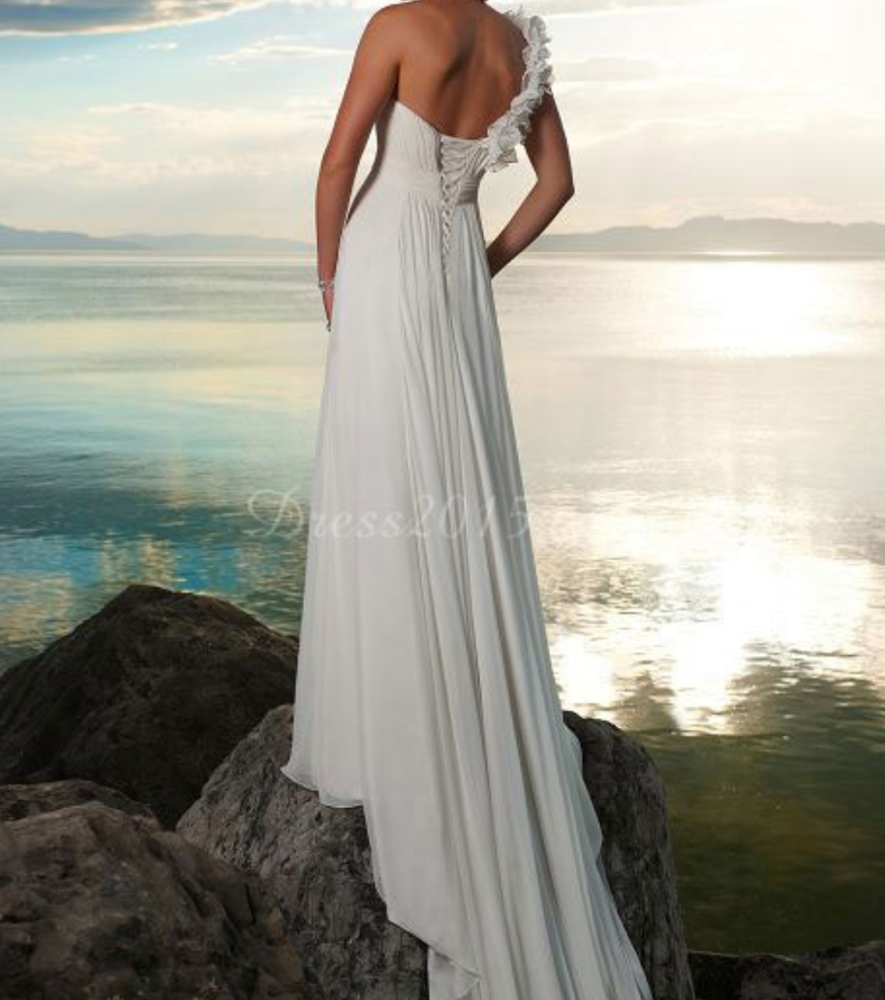 White wedding dress gown roses flowers beach tropical romantic